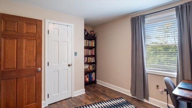 28 Philmart Dr, New Ipswich, NH 03071 - office area with dark wood-type flooring and baseboards