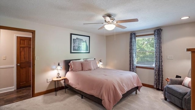 28 Philmart Dr, New Ipswich, NH 03071 - bedroom featuring light colored carpet, a textured ceiling, and ceiling fan