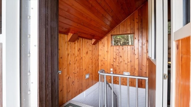 28 Philmart Dr, New Ipswich, NH 03071 - corridor with an upstairs landing, lofted ceiling, wood ceiling, and wooden walls