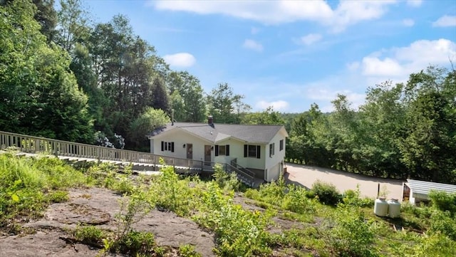 28 Philmart Dr, New Ipswich, NH 03071 - back of property featuring a chimney