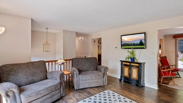28 Philmart Dr, New Ipswich, NH 03071 - living room featuring dark wood finished floors and baseboards