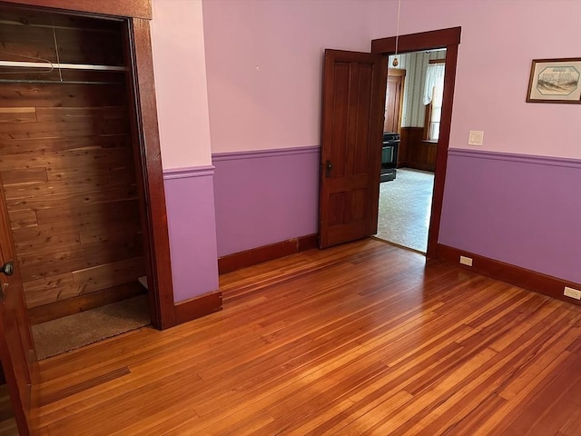41 Mayland St, Fitchburg, MA 01420 - unfurnished bedroom with light wood-type flooring, baseboards, and a closet