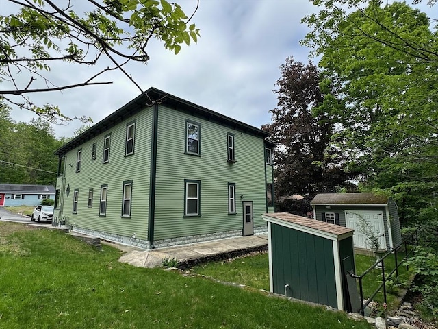 41 Mayland St, Fitchburg, MA 01420 - view of side of home featuring a lawn