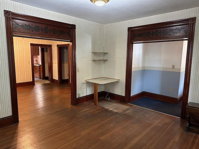 41 Mayland St, Fitchburg, MA 01420 - unfurnished room featuring wood finished floors, wallpapered walls, and baseboards