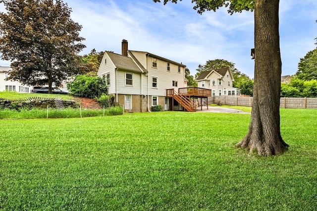 7 Beaver St, Beverly, MA 01915 - back of property with stairs, a deck, and a chimney