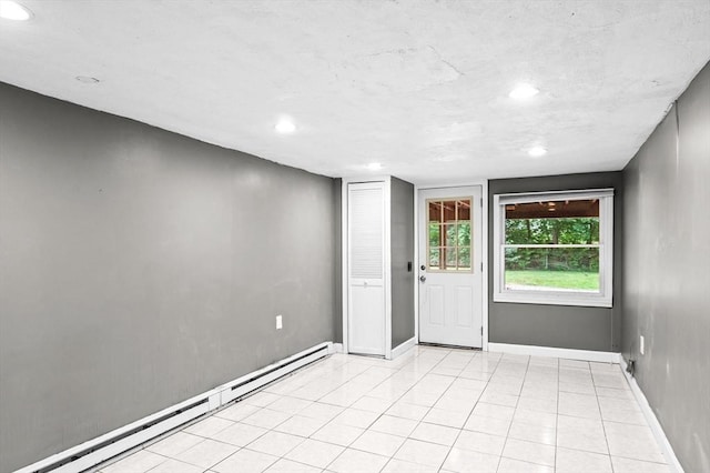 7 Beaver St, Beverly, MA 01915 - empty room featuring a baseboard heating unit, recessed lighting, baseboards, and light tile patterned floors