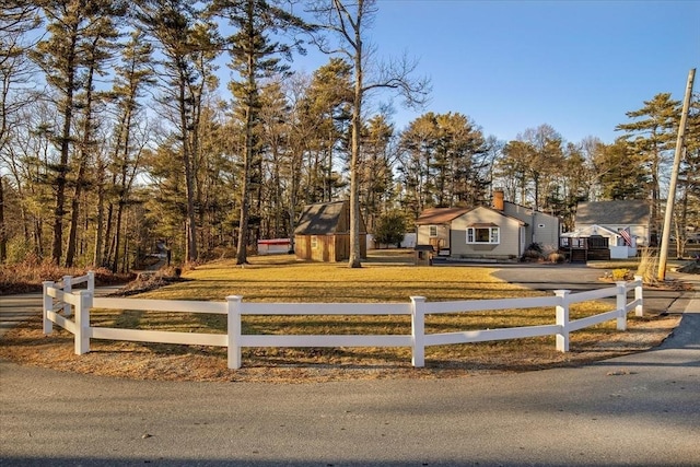 view of front of property with a fenced front yard