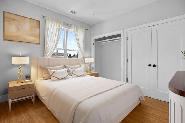 174 W 7th St Three, Unit Three, Boston, MA 02127 - bedroom with multiple closets and light wood-style flooring