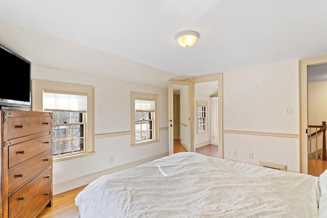 bedroom with light hardwood / wood-style flooring