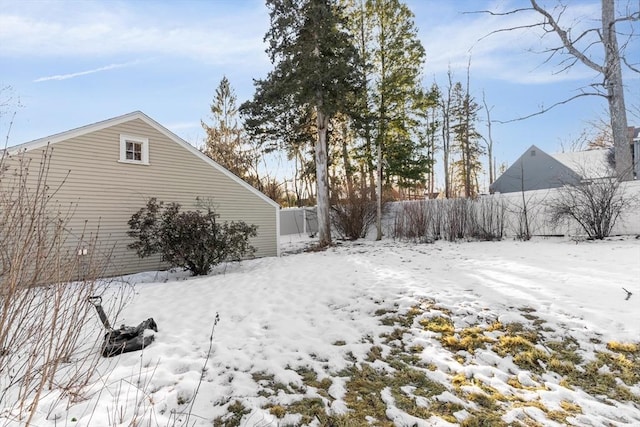 view of yard covered in snow