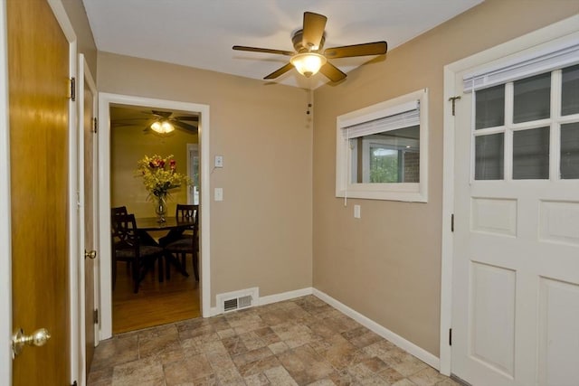 115 Carnavon Cir, Springfield, MA 01109 - washroom featuring a ceiling fan and stone finish flooring