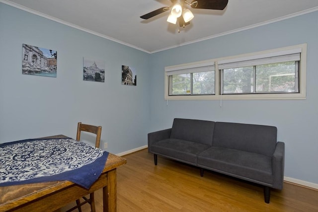 115 Carnavon Cir, Springfield, MA 01109 - bedroom with light wood finished floors, ornamental molding, and ceiling fan