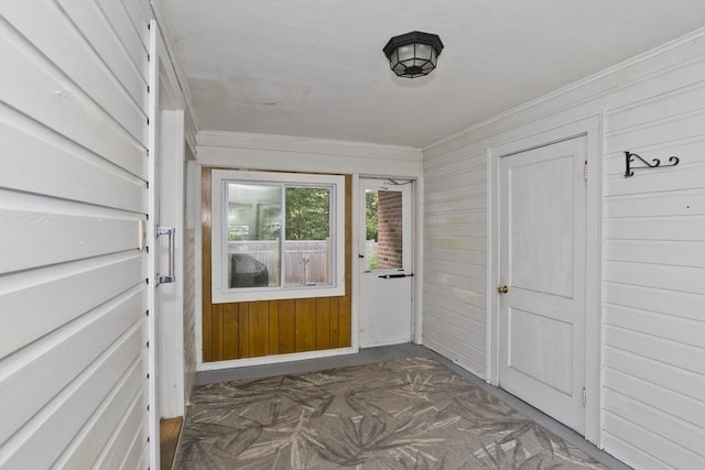 115 Carnavon Cir, Springfield, MA 01109 - doorway with wood walls and crown molding
