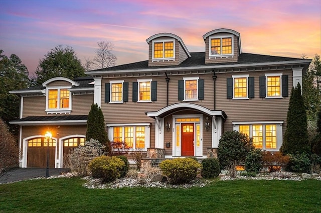 25 Wedgemere Ave, Winchester, MA 01890 - colonial inspired home featuring an attached garage, a front lawn, and driveway