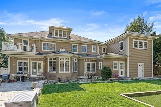 25 Wedgemere Ave, Winchester, MA 01890 - rear view of house featuring a balcony, a patio area, a shingled roof, and entry steps