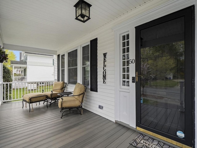 deck with covered porch