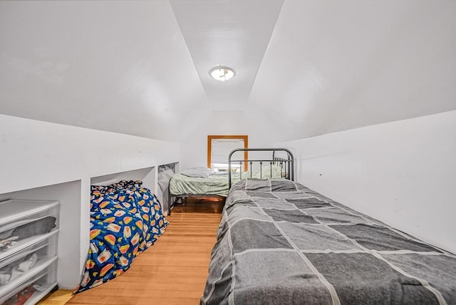 11 Murphy Ct, Newton, MA 02458 - bedroom featuring lofted ceiling and wood finished floors