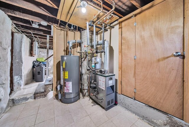 11 Murphy Ct, Newton, MA 02458 - utility room with water heater and a heating unit