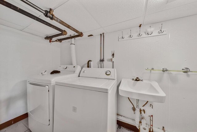 11 Murphy Ct, Newton, MA 02458 - laundry room with washer and clothes dryer and light tile patterned floors