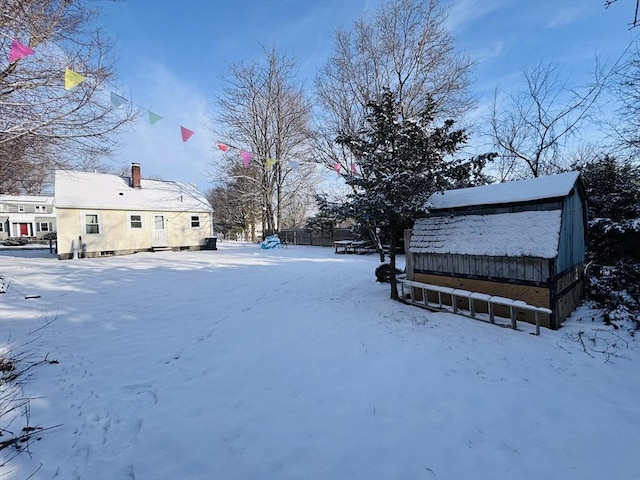 view of yard covered in snow