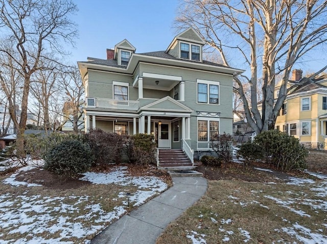 multi unit property featuring a porch