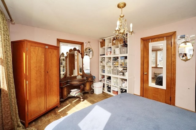 bedroom featuring a chandelier