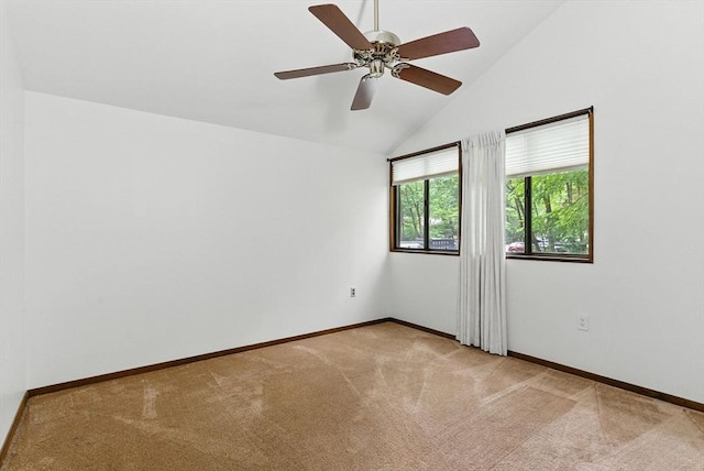 611 Old Stone Brk Unit 611, Acton, MA 01718 - spare room featuring light carpet, vaulted ceiling, and ceiling fan