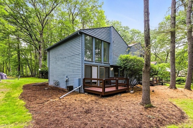 611 Old Stone Brk Unit 611, Acton, MA 01718 - back of house featuring a wooden deck