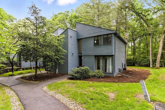 611 Old Stone Brk Unit 611, Acton, MA 01718 - view of front of home with a front lawn