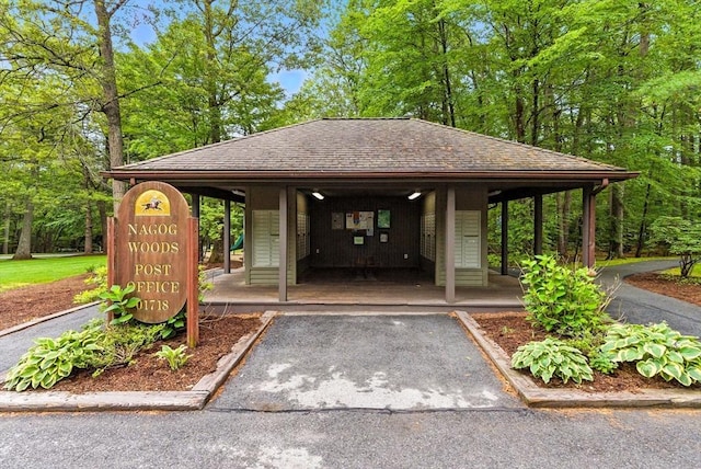 611 Old Stone Brk Unit 611, Acton, MA 01718 - view of property's community featuring a carport and driveway