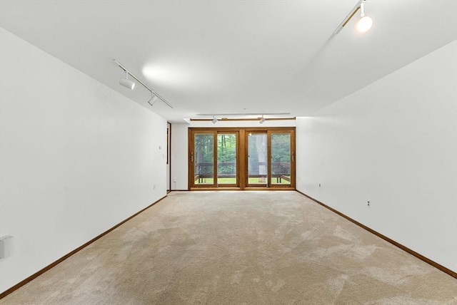 611 Old Stone Brk Unit 611, Acton, MA 01718 - carpeted spare room with track lighting and baseboards