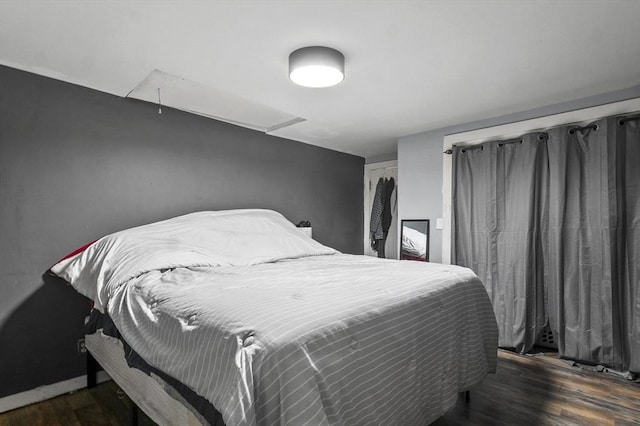 18 Cedar Ct, Lowell, MA 01852 - bedroom with attic access and wood finished floors