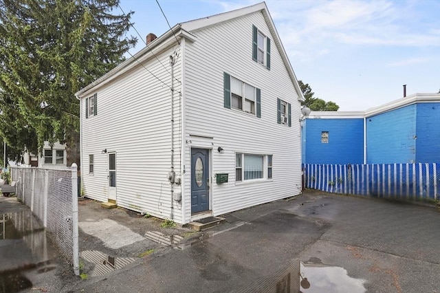 18 Cedar Ct, Lowell, MA 01852 - view of front of property with a chimney