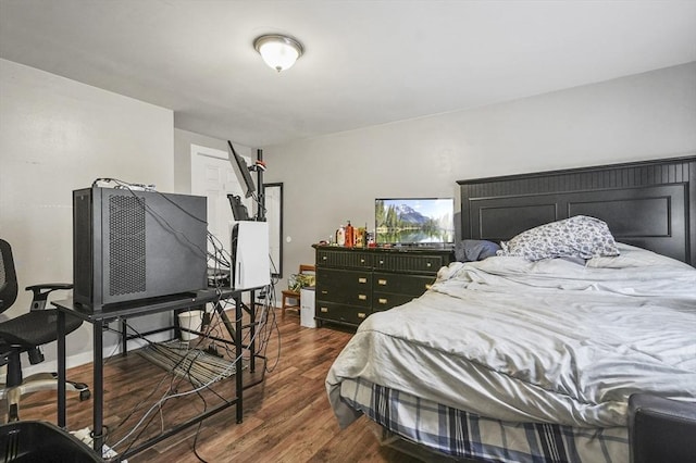 18 Cedar Ct, Lowell, MA 01852 - bedroom with dark wood-type flooring