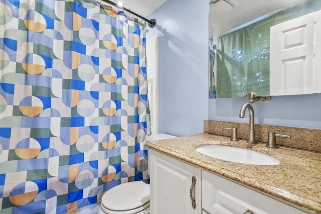 18 Cedar Ct, Lowell, MA 01852 - full bathroom featuring vanity, toilet, and a shower with curtain