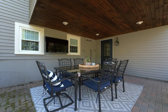 view of patio featuring outdoor dining area