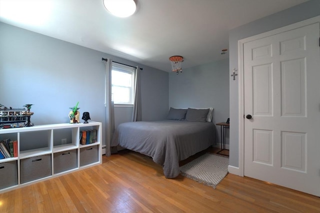 bedroom with light wood-style flooring