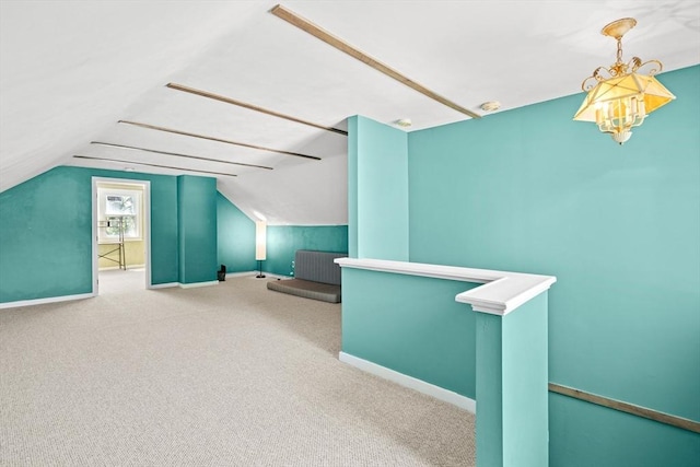 206 Pleasant St, North Andover, MA 01845 - additional living space featuring lofted ceiling, baseboards, and carpet