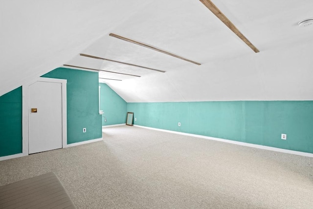 206 Pleasant St, North Andover, MA 01845 - bonus room featuring baseboards, lofted ceiling, and carpet