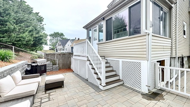 view of patio / terrace with outdoor lounge area and grilling area