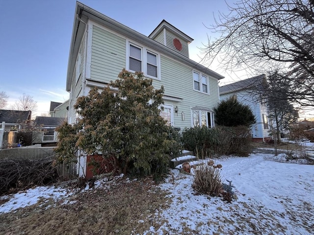 view of snow covered property