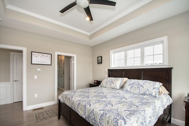 29 Spyglass Ln, Plymouth, MA 02360 - bedroom featuring wood finished floors, crown molding, a tray ceiling, baseboards, and ceiling fan