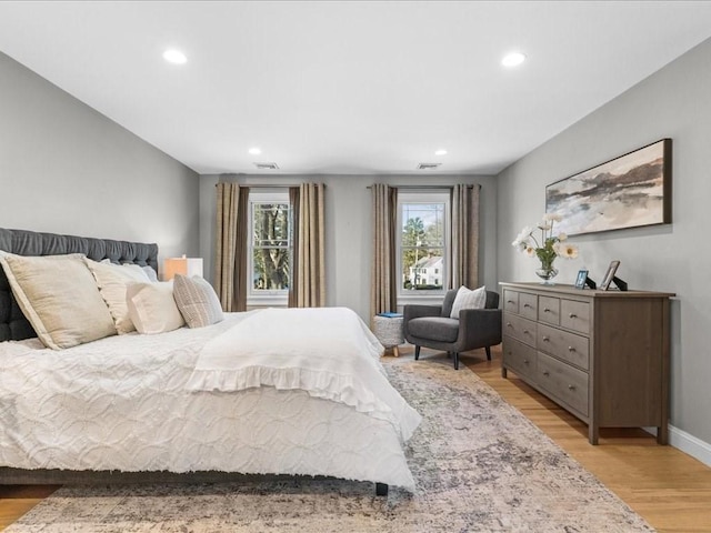 bedroom with light wood-type flooring