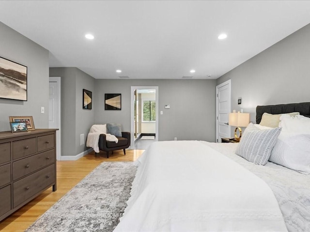 bedroom featuring light wood-type flooring