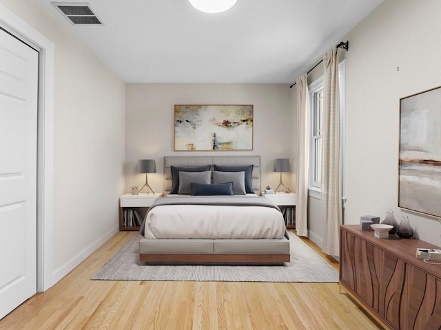 bedroom with light hardwood / wood-style flooring