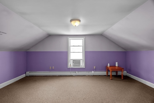 bonus room featuring a baseboard radiator, lofted ceiling, and carpet floors