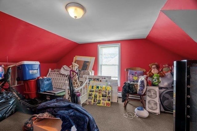 bedroom with carpet floors and lofted ceiling