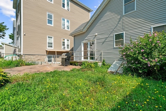 back of property with a patio area