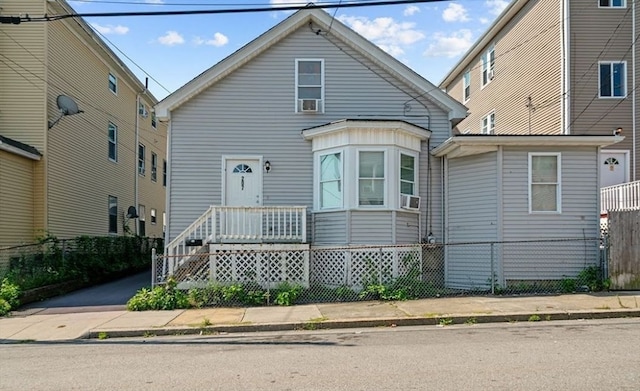 view of front of home featuring cooling unit