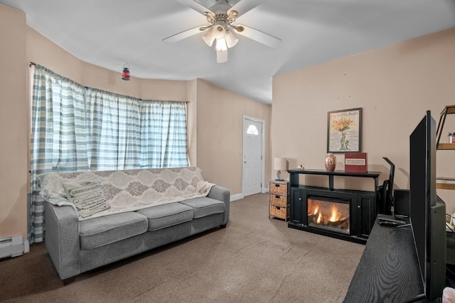 carpeted living room featuring ceiling fan and baseboard heating